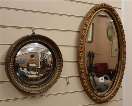 A late Victorian oval gilt framed wall mirror and a convex wall mirror (2) Convex mirror 33cm diameter